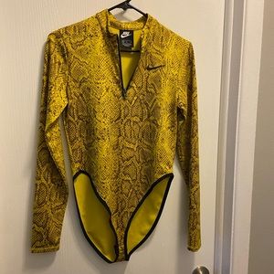 Nike body suit. Yellow snake pattern.